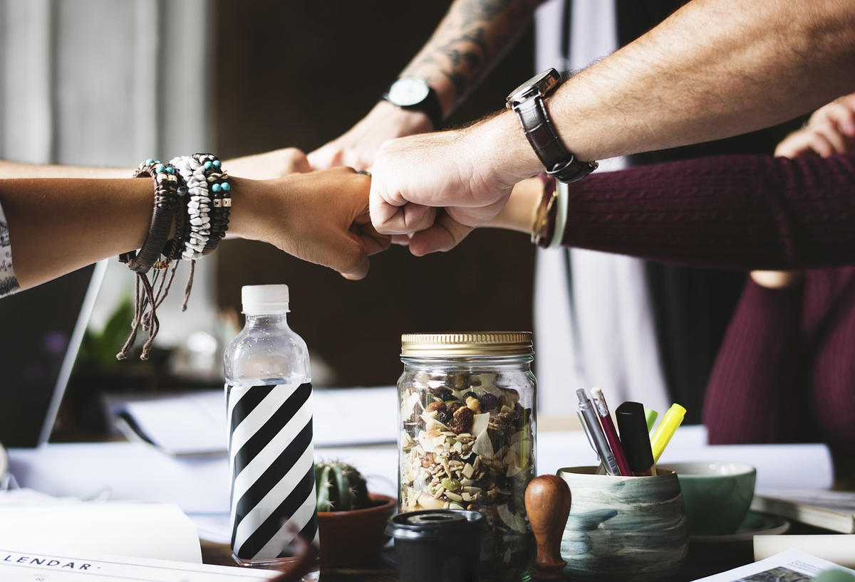 A professional accountant, acting as a guide, helps a business owner navigate through a labyrinth of complex financial documents and charts, leading them towards a clear, simplified path representing compliance and strategic financial insights.