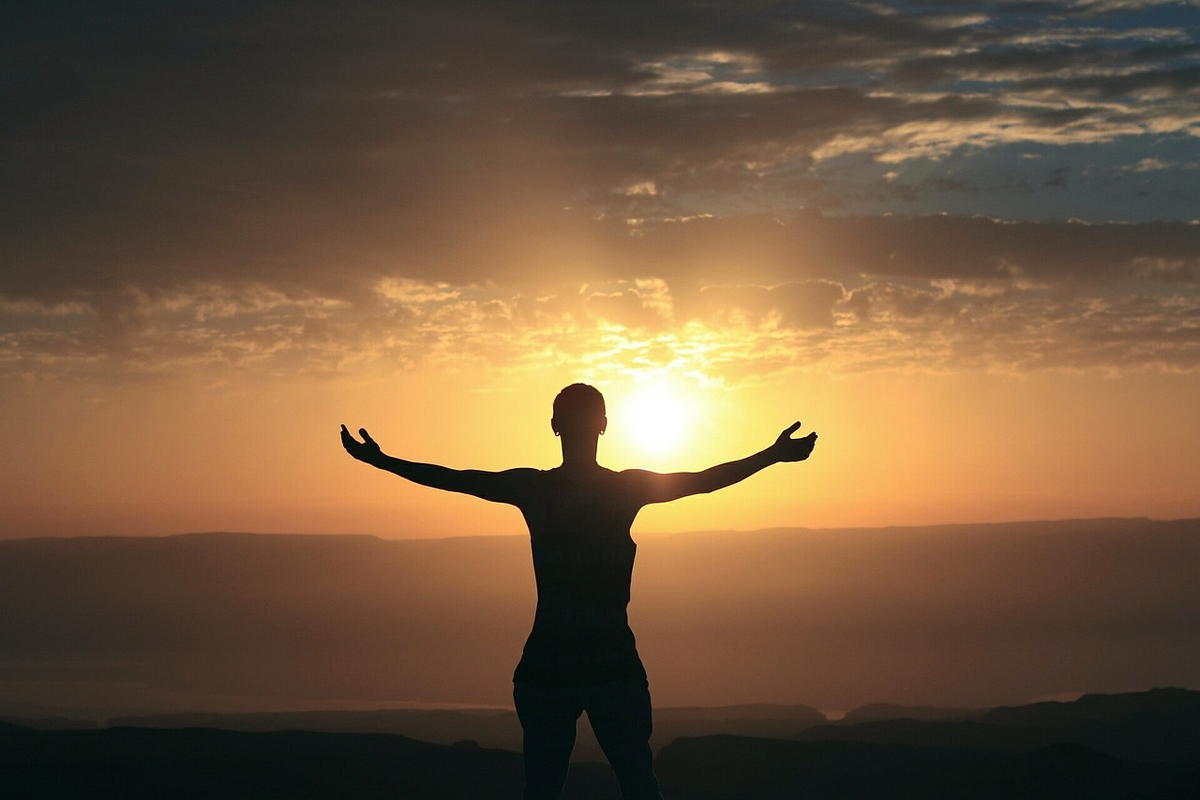 A clear, upward path or stairway constructed from glowing financial building blocks and growing green shoots, emerging from a gentle mist into a bright, expansive, and peaceful horizon, symbolizing the journey towards financial freedom and future prosperity.