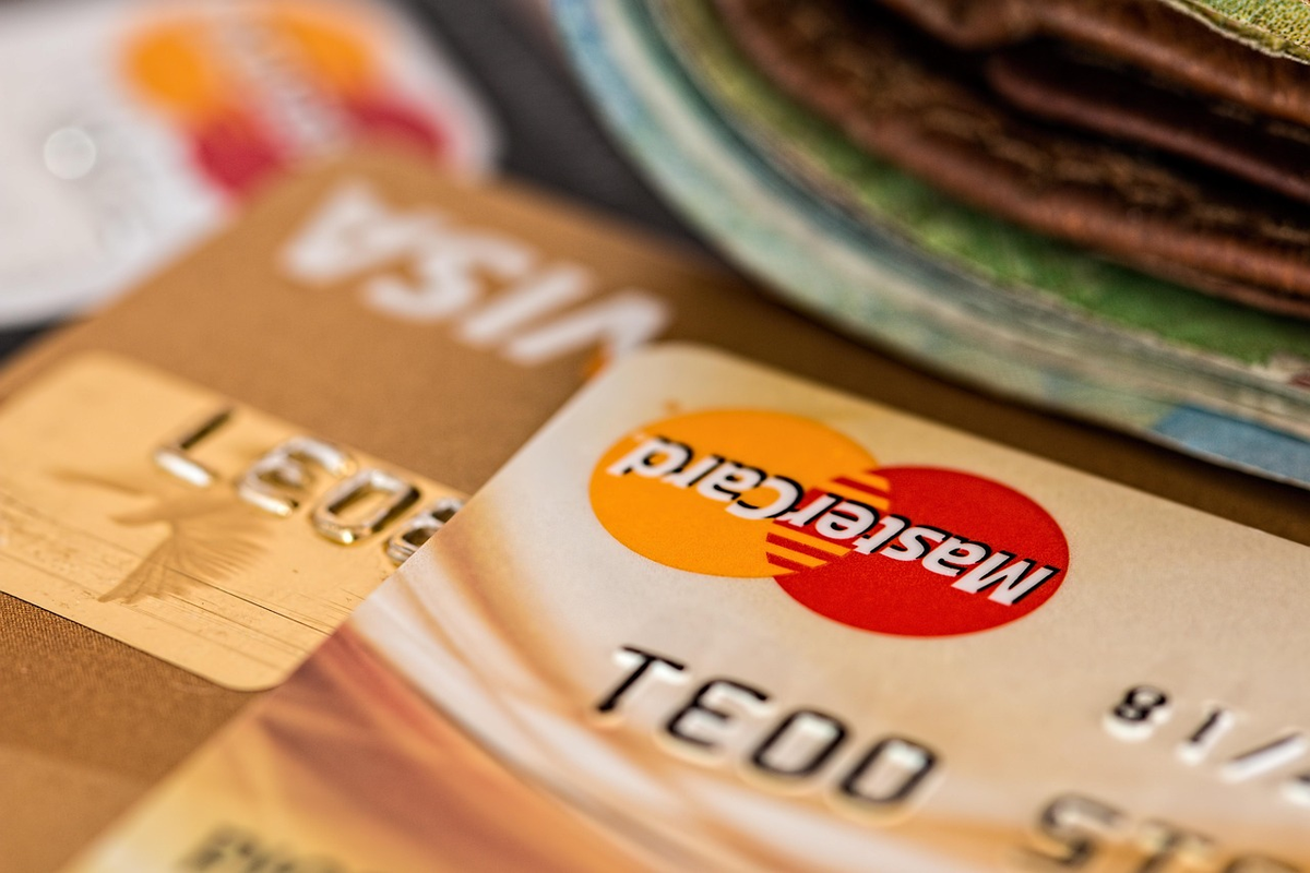 A stylized digital graph representing a credit score is meticulously being cultivated and optimized by an unseen hand, showing a clear upward trajectory that leads to a wide-open, brightly lit pathway, symbolizing financial freedom and accessibility.