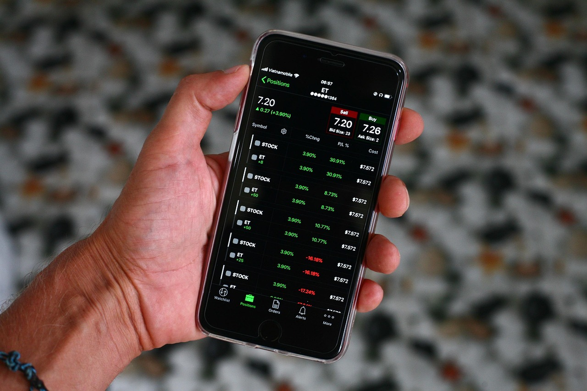 A close-up of a speculator's hands manipulating interwoven holographic projections of volatile cryptocurrency charts and traditional forex candlesticks, against a sophisticated, blurred background of a global financial hub at dusk.