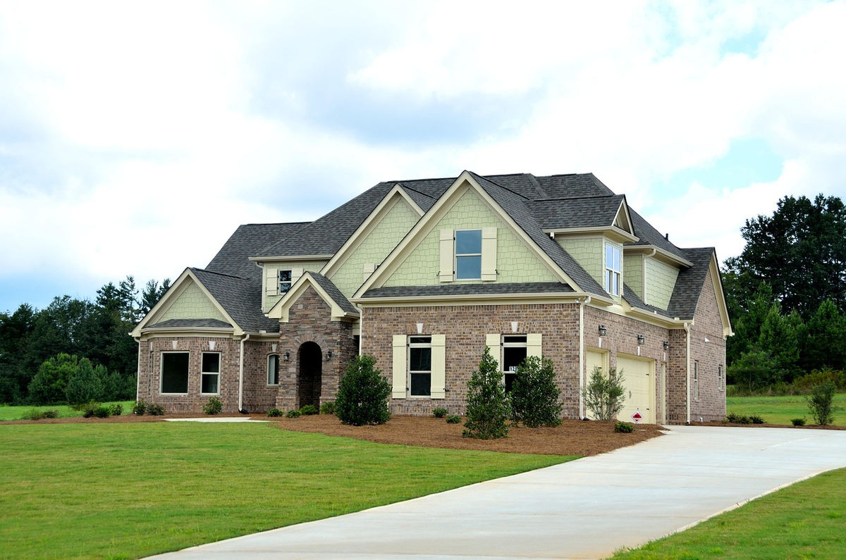 A stylized illustration of a modern house at the end of a clear, strategic pathway, with transparent layers showing financial calculations and tax forms subtly integrated into the path, symbolizing the complete process, taxes, and strategies involved in real estate sales.
