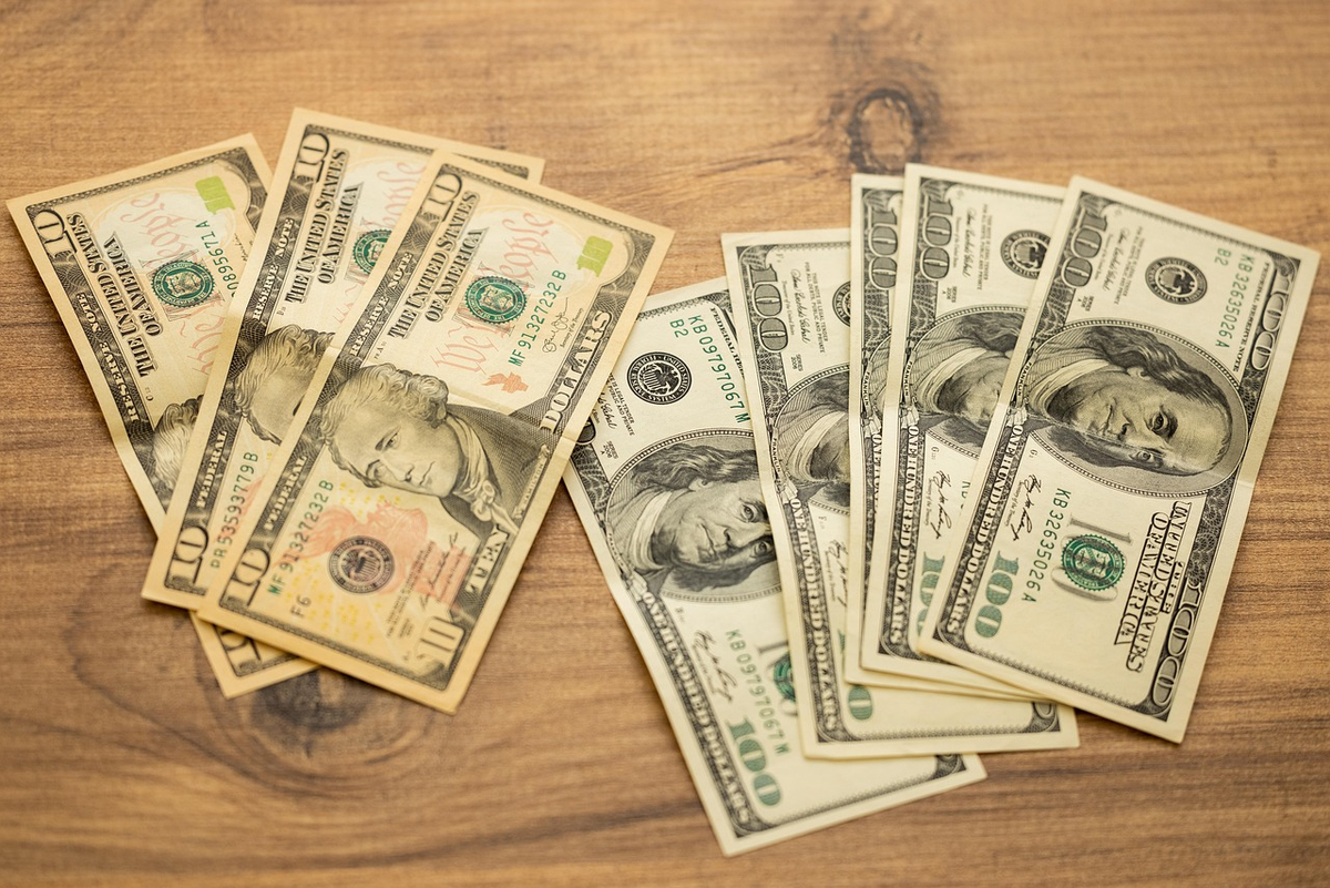 A split image contrasting two financial concepts: on one side, a small, neat stack of coins and banknotes resting on a flat, solid surface with a subtly rising line, representing secure deposits; on the other, a larger, dynamic cluster of currency symbols and upward-pointing arrows emerging from a more volatile, ascending line graph, symbolizing higher-risk investments.