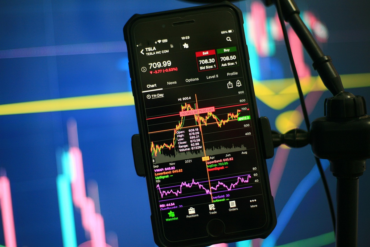 A pair of hands meticulously placing miniature, distinct models representing global stocks, real estate, commodities, and alternative loans onto a translucent, illuminated world map, symbolizing advanced portfolio diversification and strategic investment across various asset classes and geographies.