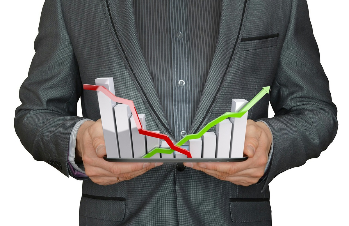A person views a transparent digital screen displaying a pension calculator's financial graphs and numbers, which then subtly merge and extend into a vibrant, peaceful scene of a comfortable retirement, illustrating the direct link between planning and future well-being.
