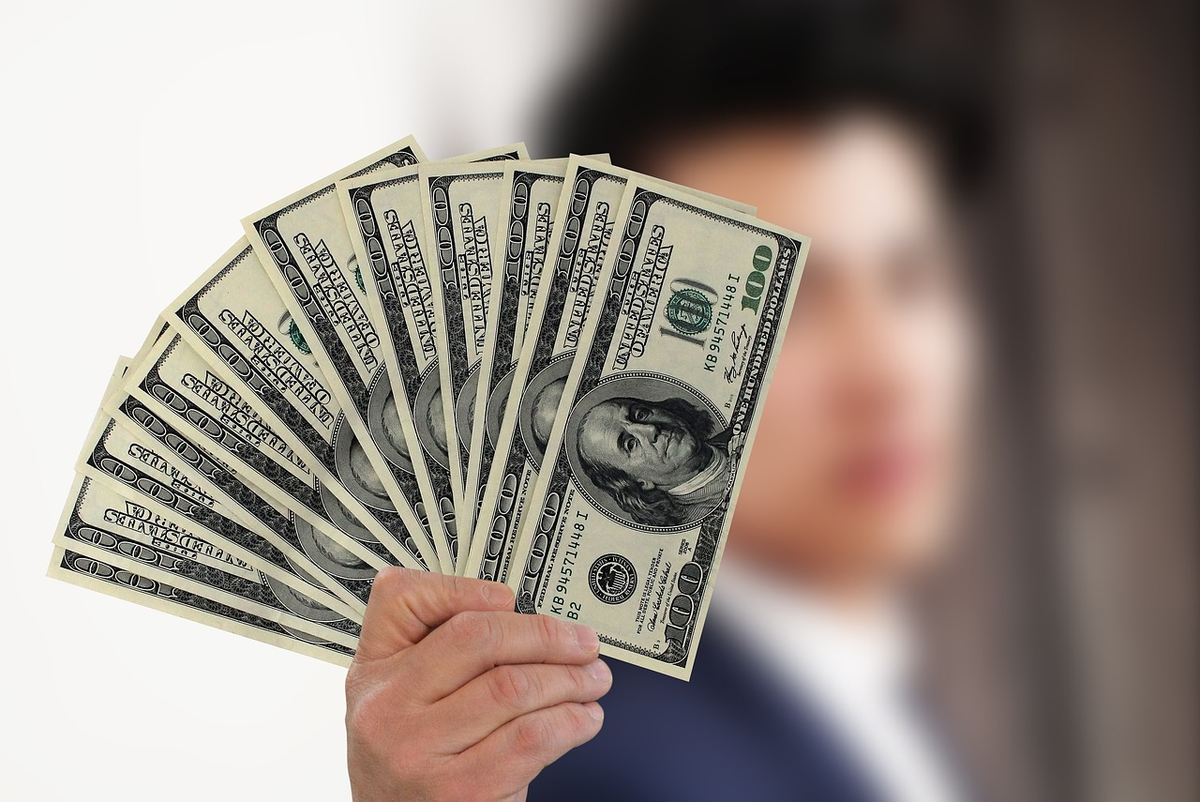 A person stands confidently on a robust financial foundation, constructed with visible elements: a lifebuoy symbolizing an emergency fund, neatly organized debt records, and a clear budget chart, all signifying meticulous practical preparation for secure investments.