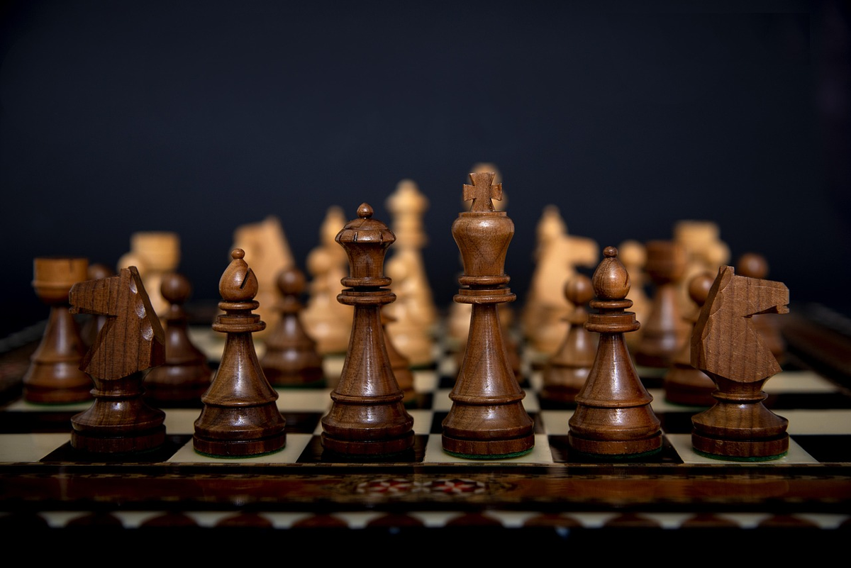 A close-up of intricate, turning gears, with each gear representing a key component of investment strategy like 'Goals,' 'Risk Tolerance,' and 'Time Horizon,' collectively powering a visual upward trajectory of financial growth.