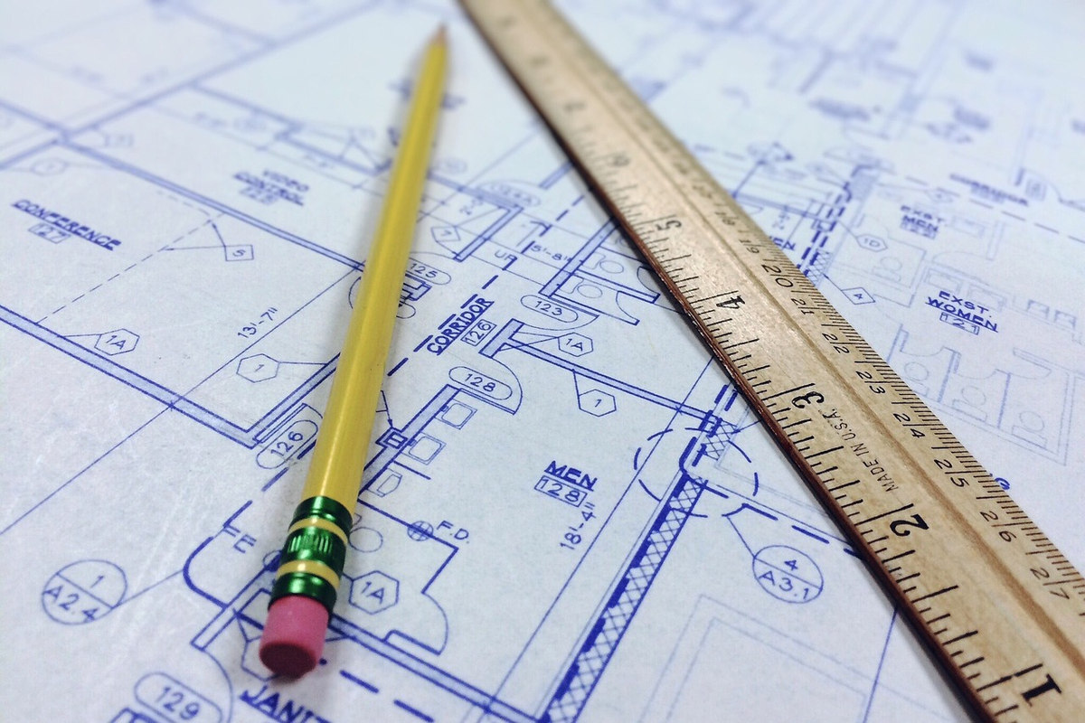 A meticulously drawn strategic business blueprint transforming into a dynamic, thriving cityscape, with visual elements of growth graphs and well-orchestrated gears symbolizing development management.