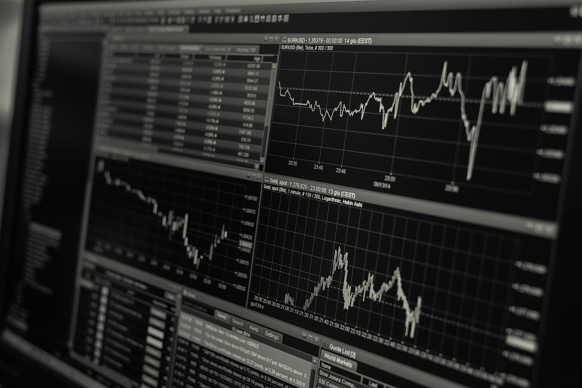 A simplified world map formed by interconnected and transparent financial charts, representing the global comparability and clarity achieved through International Financial Reporting Standards (IFRS).