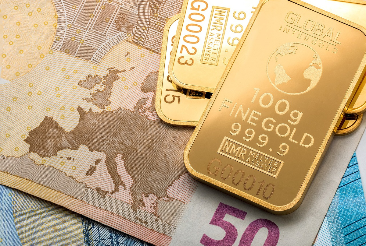 A confident hand on a sleek, modern control panel, expertly navigating a vibrant holographic display of interconnected global stock markets, diverse currency symbols, and upward-trending financial charts, symbolizing strategic international investment.